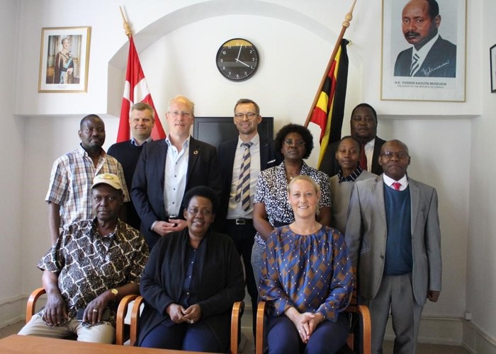 Kabatsi (centre), members of the Copenhagen Mission Team, and organisers of the fair at the embassy